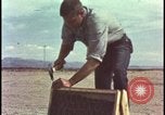 Image of atomic bomb testing of combustible insulation samples Nevada United States USA, 1955, second 10 stock footage video 65675078379