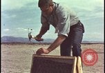 Image of atomic bomb testing of combustible insulation samples Nevada United States USA, 1955, second 11 stock footage video 65675078379