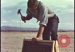 Image of atomic bomb testing of combustible insulation samples Nevada United States USA, 1955, second 12 stock footage video 65675078379