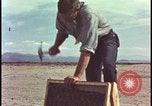 Image of atomic bomb testing of combustible insulation samples Nevada United States USA, 1955, second 13 stock footage video 65675078379