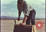 Image of atomic bomb testing of combustible insulation samples Nevada United States USA, 1955, second 14 stock footage video 65675078379