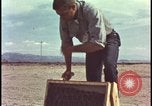 Image of atomic bomb testing of combustible insulation samples Nevada United States USA, 1955, second 15 stock footage video 65675078379