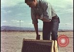 Image of atomic bomb testing of combustible insulation samples Nevada United States USA, 1955, second 16 stock footage video 65675078379