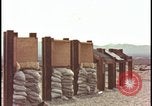 Image of atomic bomb testing of combustible insulation samples Nevada United States USA, 1955, second 35 stock footage video 65675078379