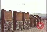 Image of atomic bomb testing of combustible insulation samples Nevada United States USA, 1955, second 36 stock footage video 65675078379