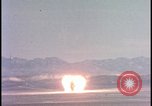 Image of dust cloud from tactical nuclear explosion Nevada United States USA, 1955, second 5 stock footage video 65675078386