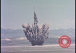 Image of dust cloud from tactical nuclear explosion Nevada United States USA, 1955, second 8 stock footage video 65675078386