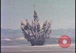 Image of dust cloud from tactical nuclear explosion Nevada United States USA, 1955, second 9 stock footage video 65675078386