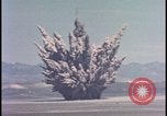 Image of dust cloud from tactical nuclear explosion Nevada United States USA, 1955, second 11 stock footage video 65675078386