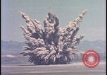 Image of dust cloud from tactical nuclear explosion Nevada United States USA, 1955, second 13 stock footage video 65675078386