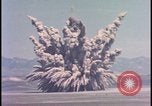 Image of dust cloud from tactical nuclear explosion Nevada United States USA, 1955, second 14 stock footage video 65675078386