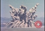 Image of dust cloud from tactical nuclear explosion Nevada United States USA, 1955, second 17 stock footage video 65675078386