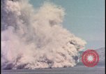 Image of dust cloud from tactical nuclear explosion Nevada United States USA, 1955, second 25 stock footage video 65675078386