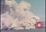 Image of dust cloud from tactical nuclear explosion Nevada United States USA, 1955, second 26 stock footage video 65675078386