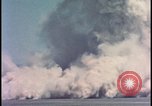 Image of dust cloud from tactical nuclear explosion Nevada United States USA, 1955, second 33 stock footage video 65675078386