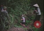 Immagine di Abitanti di un villaggio vietnamita Vietnam, 1967, secondo 38 filmato di repertorio 65675078409