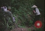 Immagine di Abitanti di un villaggio vietnamita Vietnam, 1967, secondo 39 filmato di repertorio 65675078409