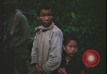 Immagine di Abitanti di un villaggio vietnamita Vietnam, 1967, secondo 49 filmato di repertorio 65675078409