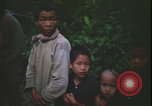 Immagine di Abitanti di un villaggio vietnamita Vietnam, 1967, secondo 51 filmato di repertorio 65675078409
