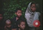 Immagine di Abitanti di un villaggio vietnamita Vietnam, 1967, secondo 56 filmato di repertorio 65675078409