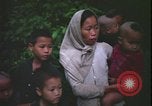 Immagine di Abitanti di un villaggio vietnamita Vietnam, 1967, secondo 58 filmato di repertorio 65675078409