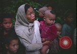 Immagine di Abitanti di un villaggio vietnamita Vietnam, 1967, secondo 60 filmato di repertorio 65675078409