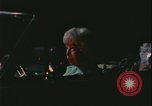 Image of elderly woman driving United States USA, 1977, second 20 stock footage video 65675078430