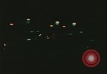 Image of elderly woman driving United States USA, 1977, second 26 stock footage video 65675078430