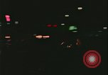 Image of elderly woman driving United States USA, 1977, second 28 stock footage video 65675078430