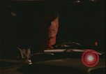 Image of elderly woman driving United States USA, 1977, second 34 stock footage video 65675078430