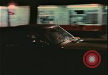 Image of elderly woman driving United States USA, 1977, second 35 stock footage video 65675078430