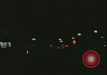 Image of elderly woman driving United States USA, 1977, second 49 stock footage video 65675078430