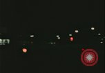 Image of elderly woman driving United States USA, 1977, second 56 stock footage video 65675078430