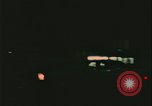 Image of elderly woman driving United States USA, 1977, second 57 stock footage video 65675078430