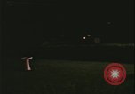 Image of elderly woman driving United States USA, 1977, second 62 stock footage video 65675078430