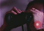 Immagine di notte finestre appartamento United States USA, 1977, secondo 10 filmato di repertorio 65675078432