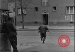 Image of street fighting US soldiers Halle Germany, 1945, second 5 stock footage video 65675078458