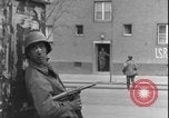 Image of street fighting US soldiers Halle Germany, 1945, second 12 stock footage video 65675078458