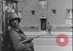Image of street fighting US soldiers Halle Germany, 1945, second 13 stock footage video 65675078458