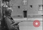 Image of street fighting US soldiers Halle Germany, 1945, second 16 stock footage video 65675078458