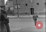 Image of street fighting US soldiers Halle Germany, 1945, second 18 stock footage video 65675078458