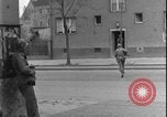 Image of street fighting US soldiers Halle Germany, 1945, second 19 stock footage video 65675078458