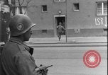 Image of street fighting US soldiers Halle Germany, 1945, second 23 stock footage video 65675078458