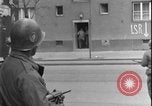 Image of street fighting US soldiers Halle Germany, 1945, second 24 stock footage video 65675078458