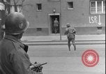 Image of street fighting US soldiers Halle Germany, 1945, second 28 stock footage video 65675078458