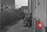 Image of street fighting US soldiers Halle Germany, 1945, second 30 stock footage video 65675078458