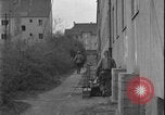 Image of street fighting US soldiers Halle Germany, 1945, second 31 stock footage video 65675078458