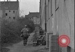 Image of street fighting US soldiers Halle Germany, 1945, second 36 stock footage video 65675078458