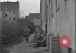 Image of street fighting US soldiers Halle Germany, 1945, second 37 stock footage video 65675078458
