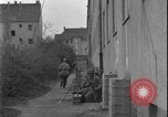 Image of street fighting US soldiers Halle Germany, 1945, second 38 stock footage video 65675078458